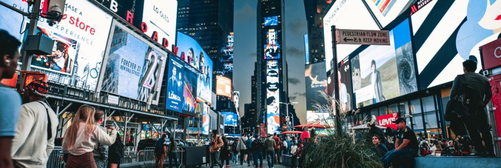 Digital advertisments on a busy street outdoors